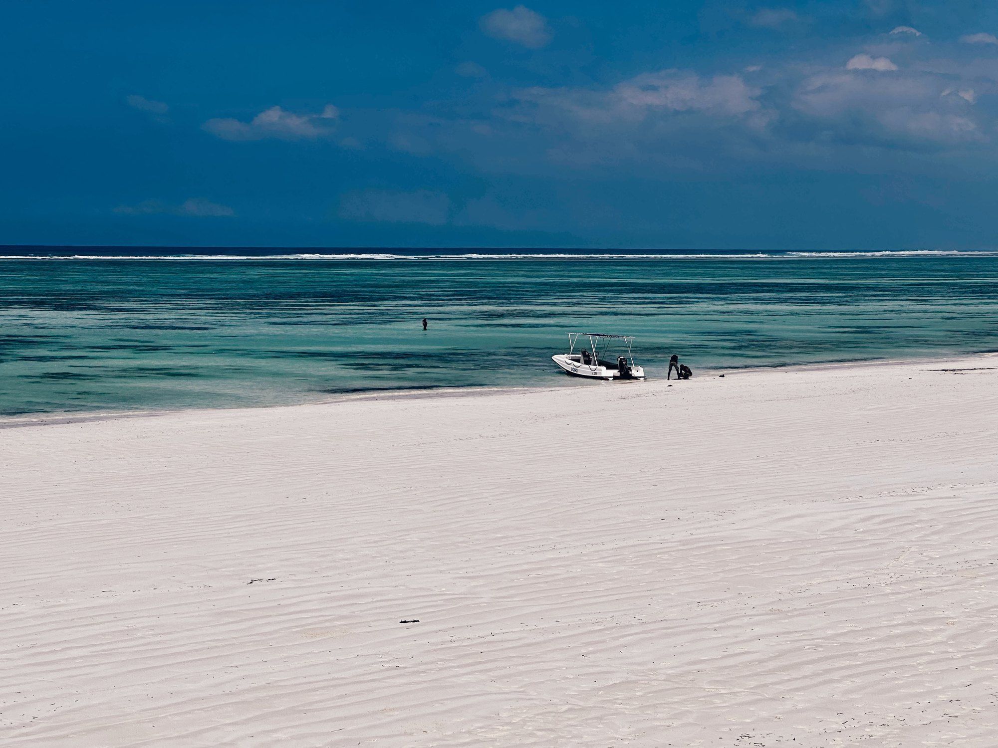 White-sand beach and turquoise Indian Ocean near Matemwe and Mnemba Island in Zanzibar